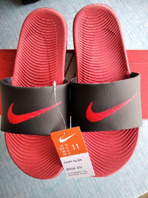 red and black nike slides