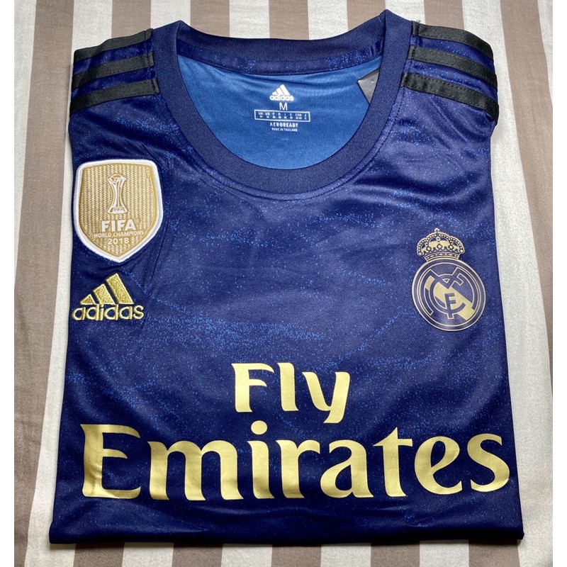 blue fly emirates jersey