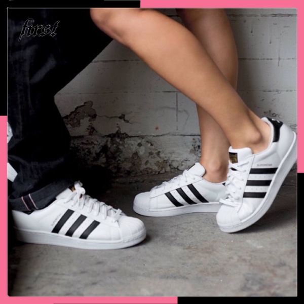 couple sneakers adidas