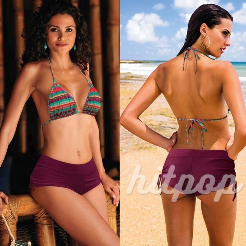 swim shorts and bikini top