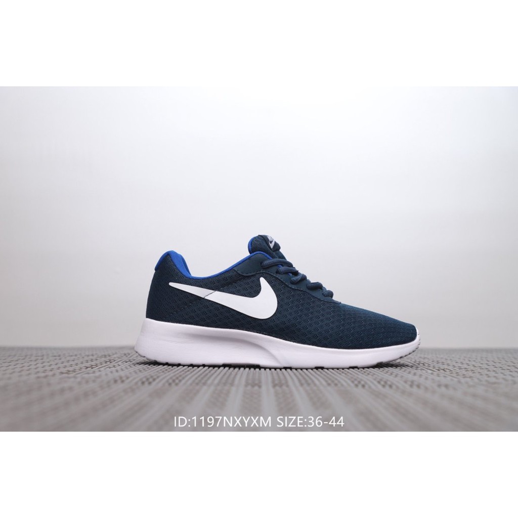 light blue nike tanjun