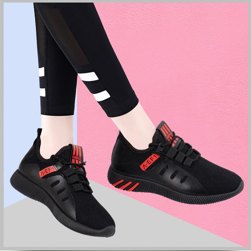 black slip on sports shoes