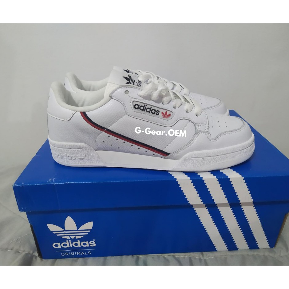 adidas continental blue stripe