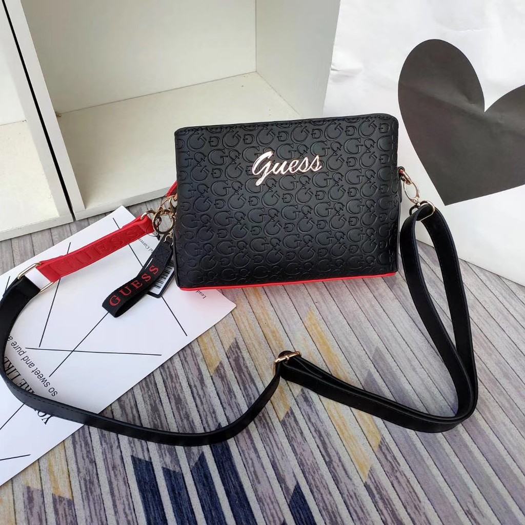 Guess sling bag original price on sale