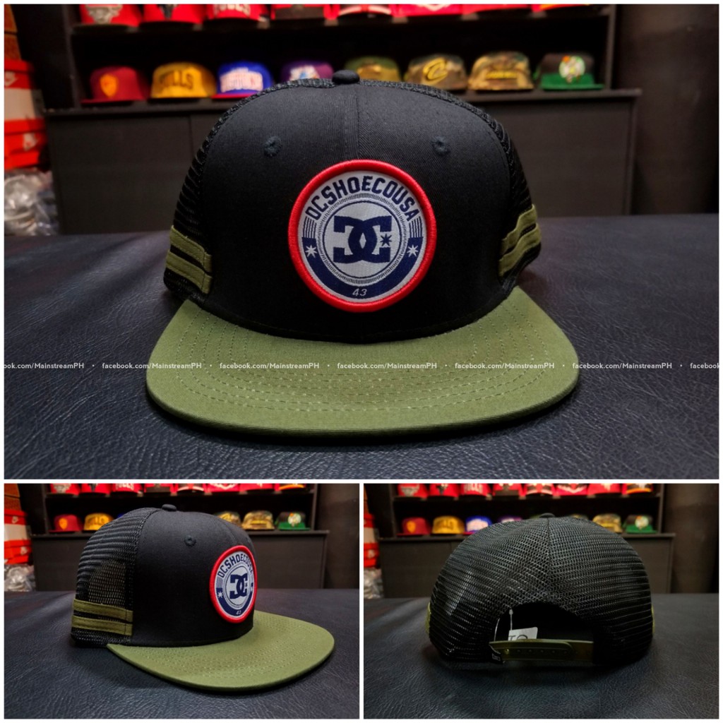 black and green dc hat