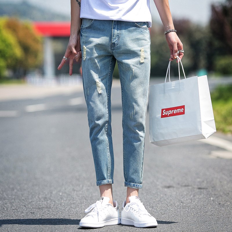 supreme ripped jeans