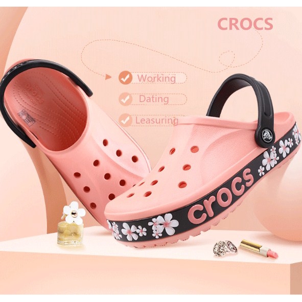pink crocs with flowers