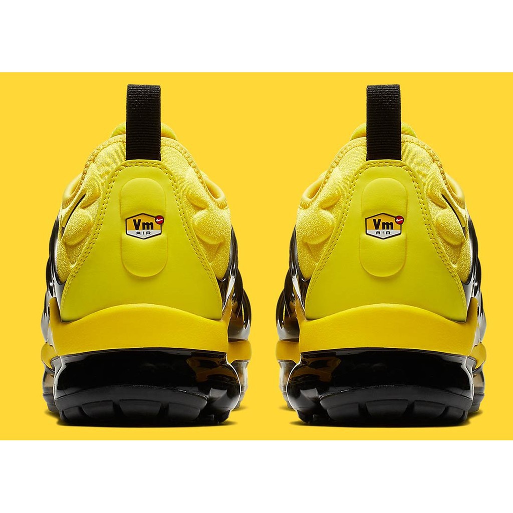 yellow and white vapormax plus