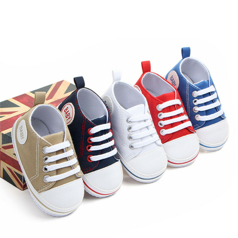 white newborn baby shoes