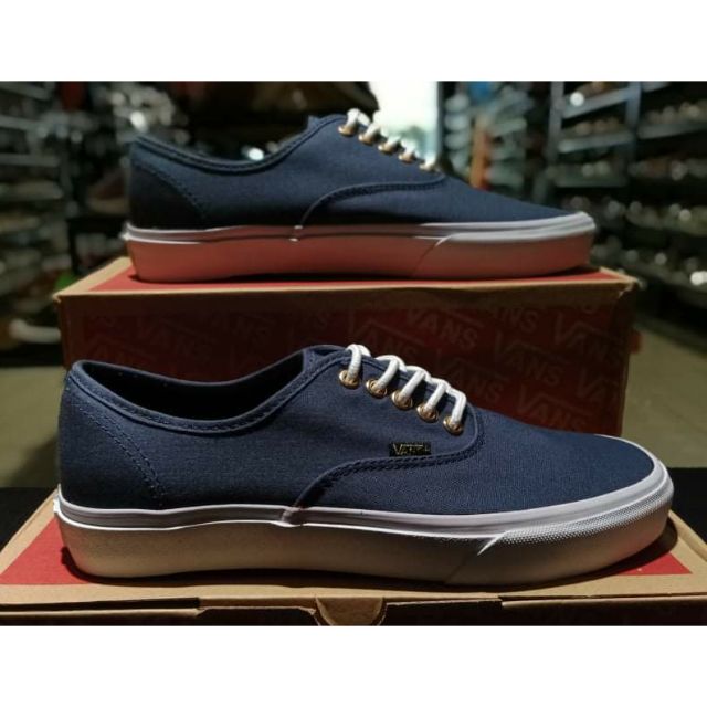 navy and white vans