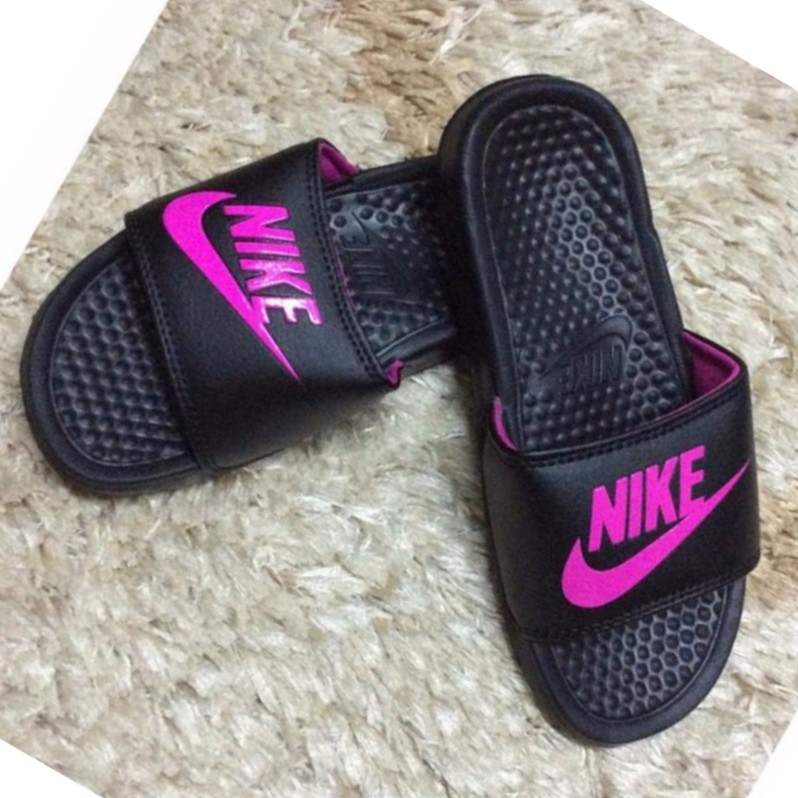 purple nike slippers