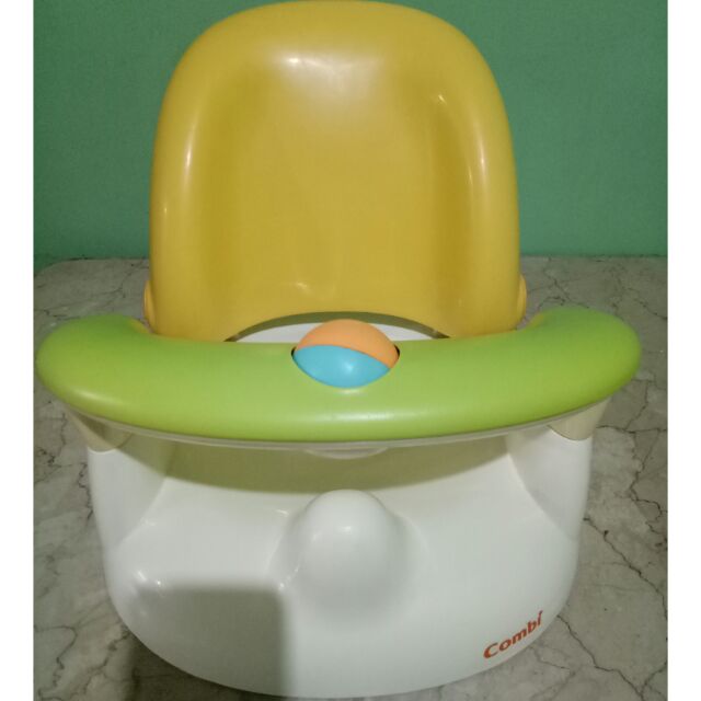 green baby bath seat