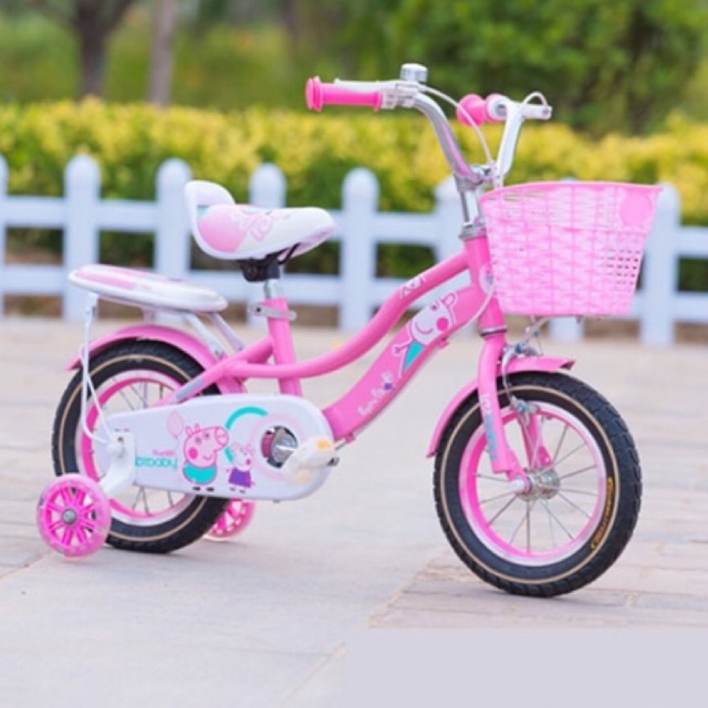 pink bicycle with basket
