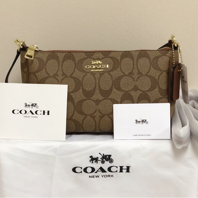coach messico top handle pouch