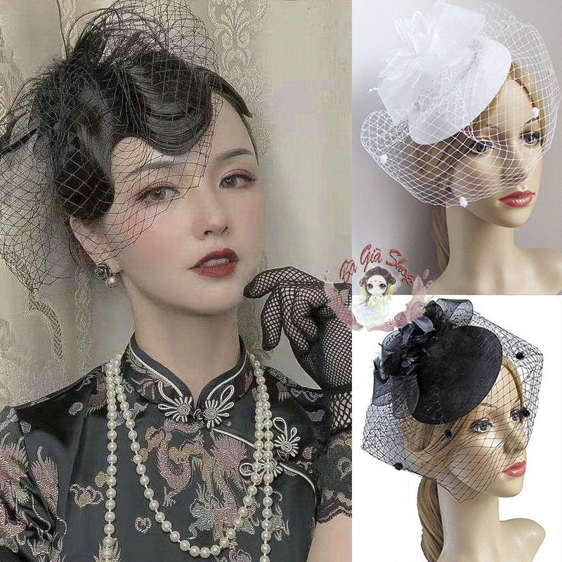 Headdress with black or white veil