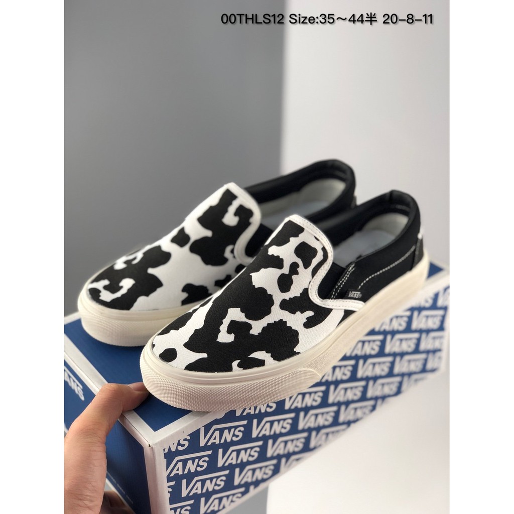 vans slip on cow