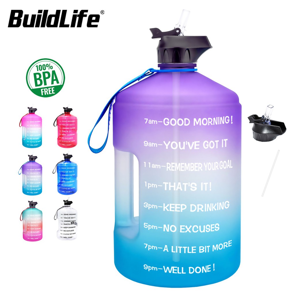 water bottle with measurements and straw