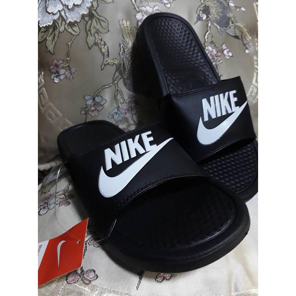 benassi swoosh slides