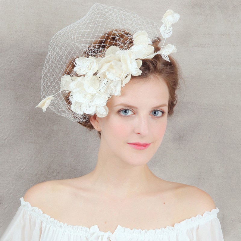 white wedding hat with veil