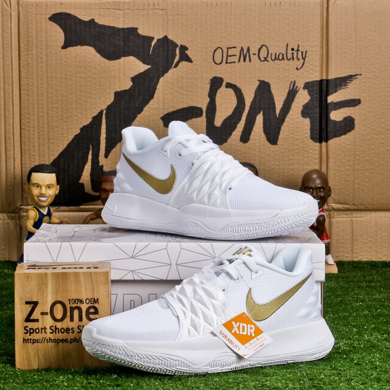 white and gold nike basketball shoes