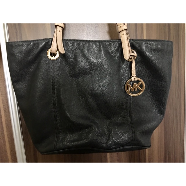 are michael kors purses real leather