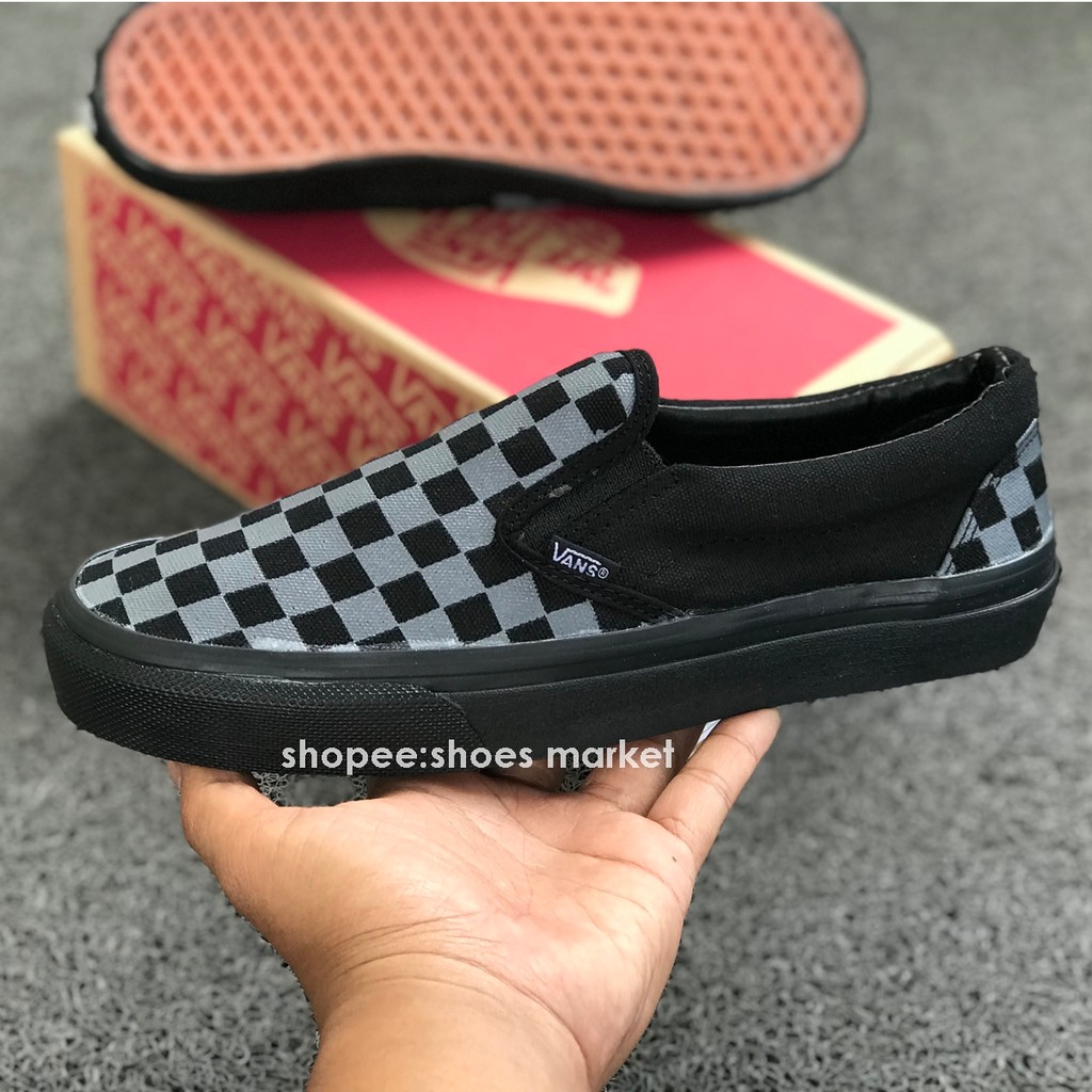 gray slip on checkered vans