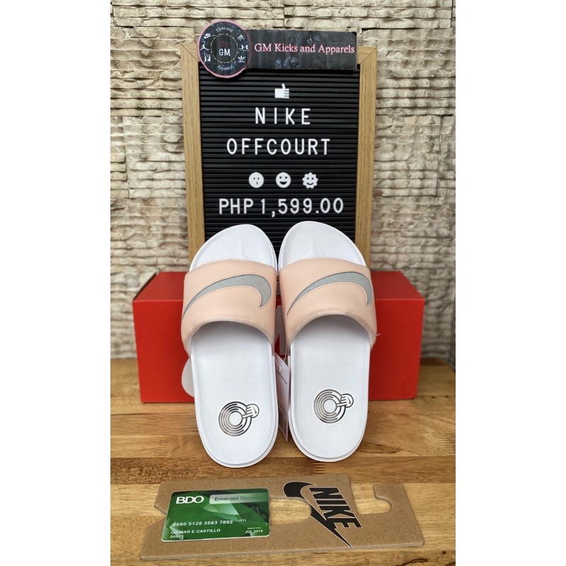 coral nike slides