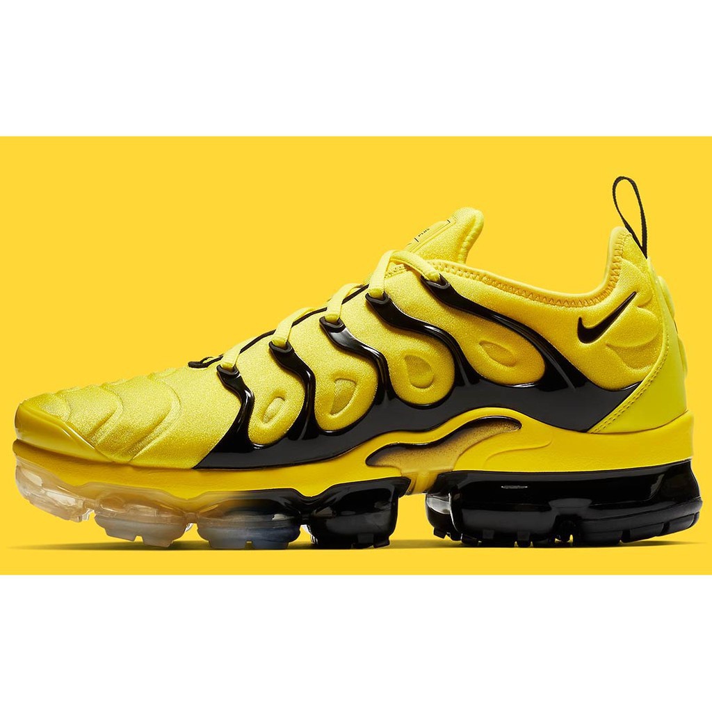 yellow and white vapormax plus