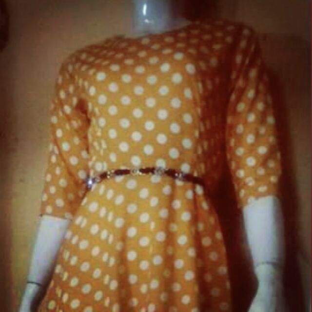 orange and black polka dot dress