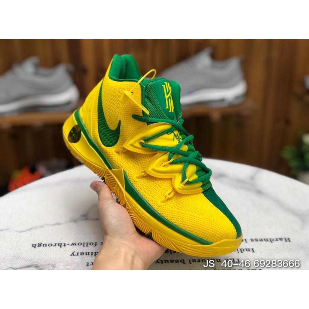 green and yellow basketball shoes