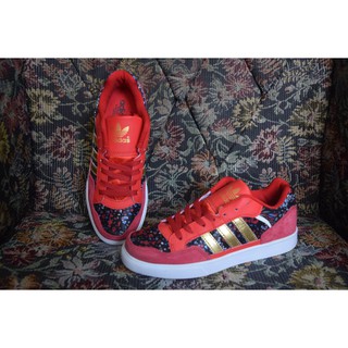 bright red adidas shoes