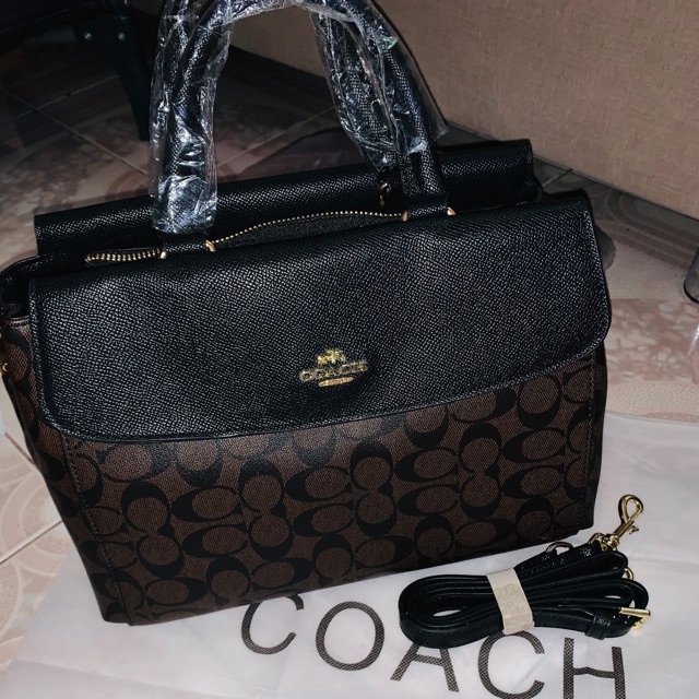 coach 2 way sling bag