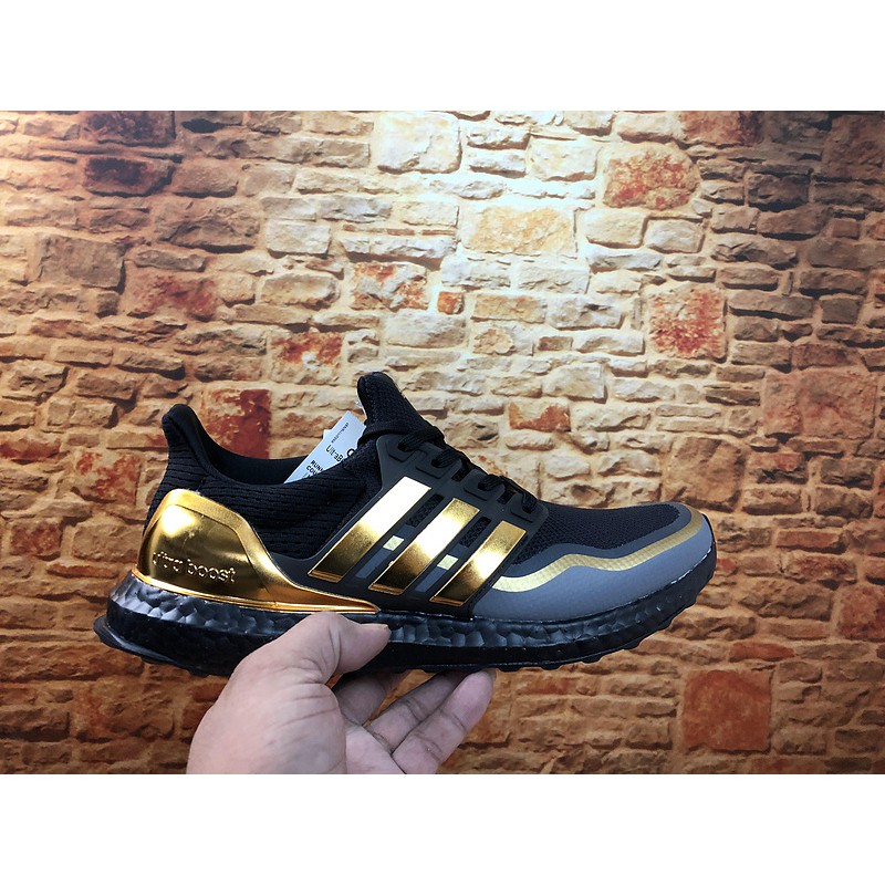 adidas ultra boost mens black and gold
