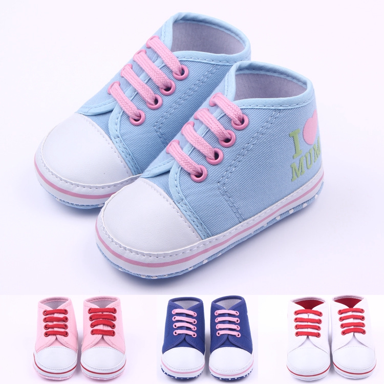 pink and blue baby shoes