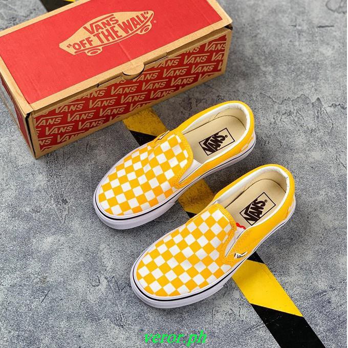 black white and yellow checkerboard vans