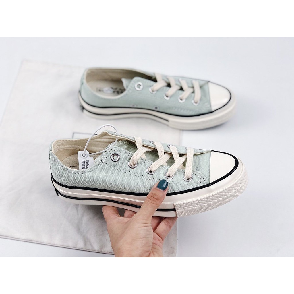 mint green canvas shoes