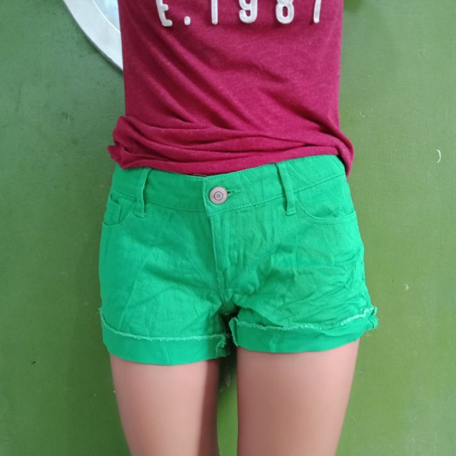 green denim shorts