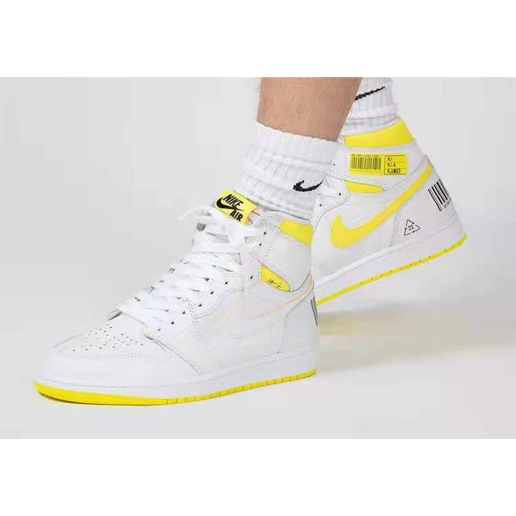 white and yellow jordan 1