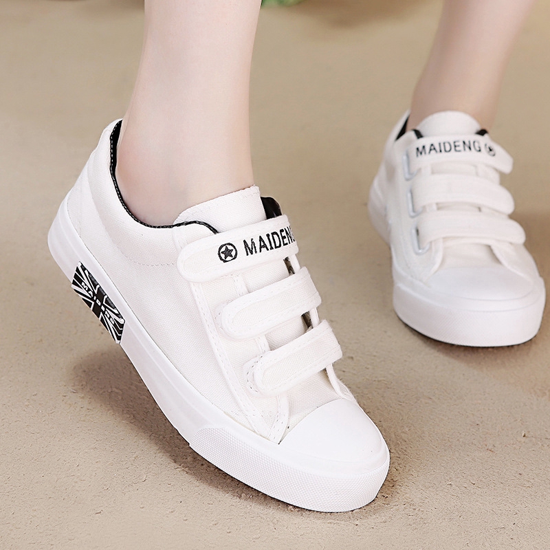 white canvas velcro shoes