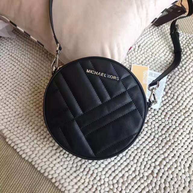 mk round sling bag