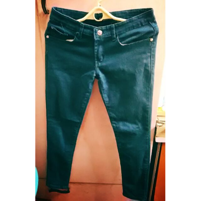 bluish green jeans