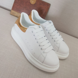 white and gold alexander mcqueen sneakers