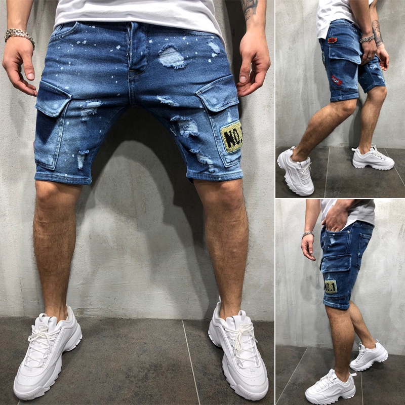 guy in short denim shorts