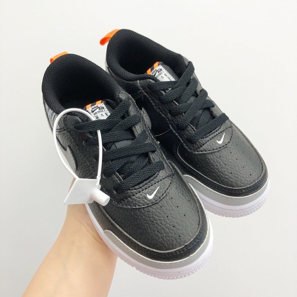 nike black sneakers boys