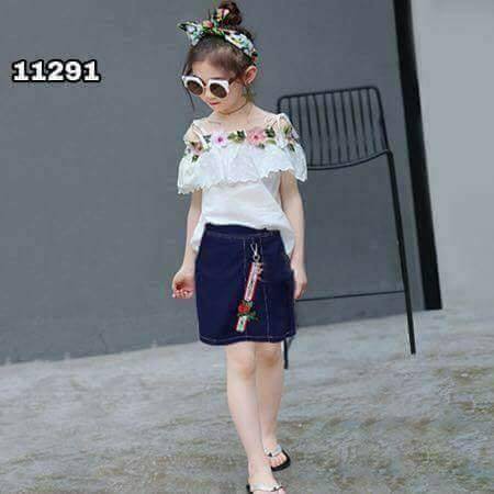 red top and denim skirt