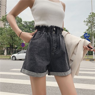 big girl wearing high waisted shorts