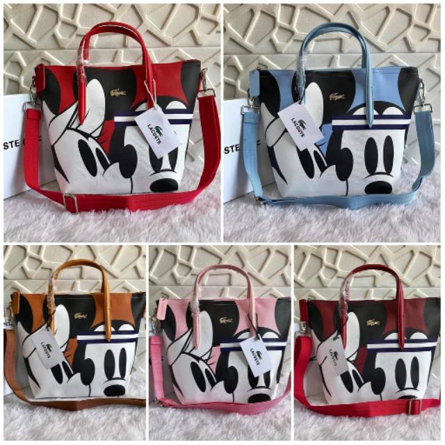 lacoste mickey mouse bag price