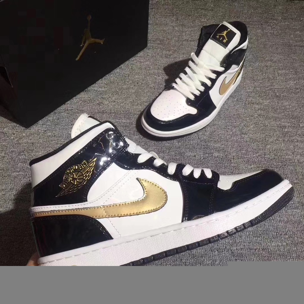 jordan mid black gold