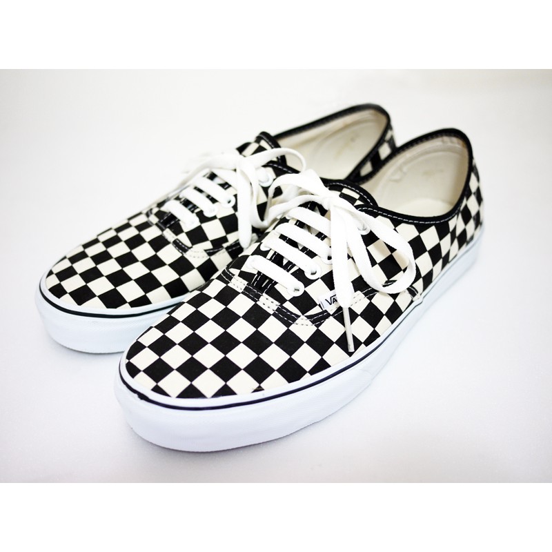 vans black and white checkered lace up sneakers