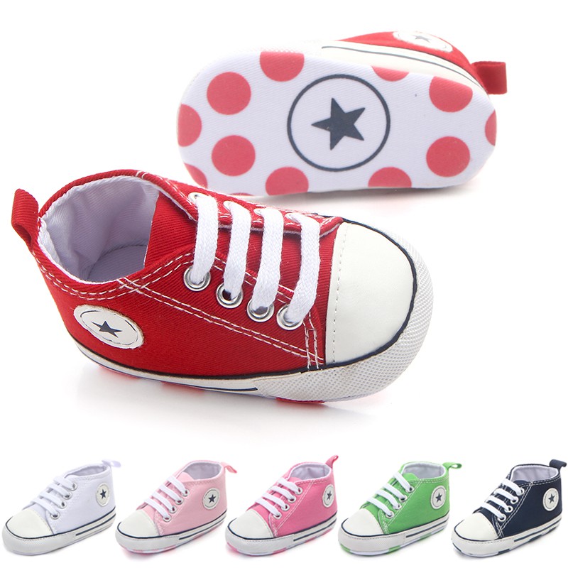 white canvas baby shoes